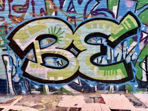 BE